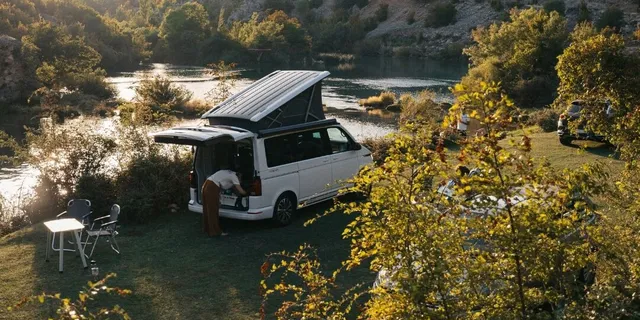 Camper at a river