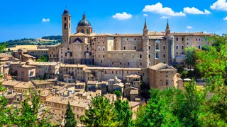 Italy Brands: The university town of Urbino with its beautiful stone structures from above belongs to the highlights of the region.