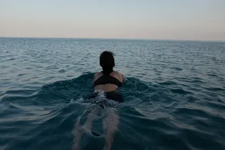 Woman swimming in the water