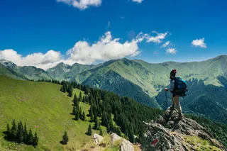 Wanderer at a summit in Austria